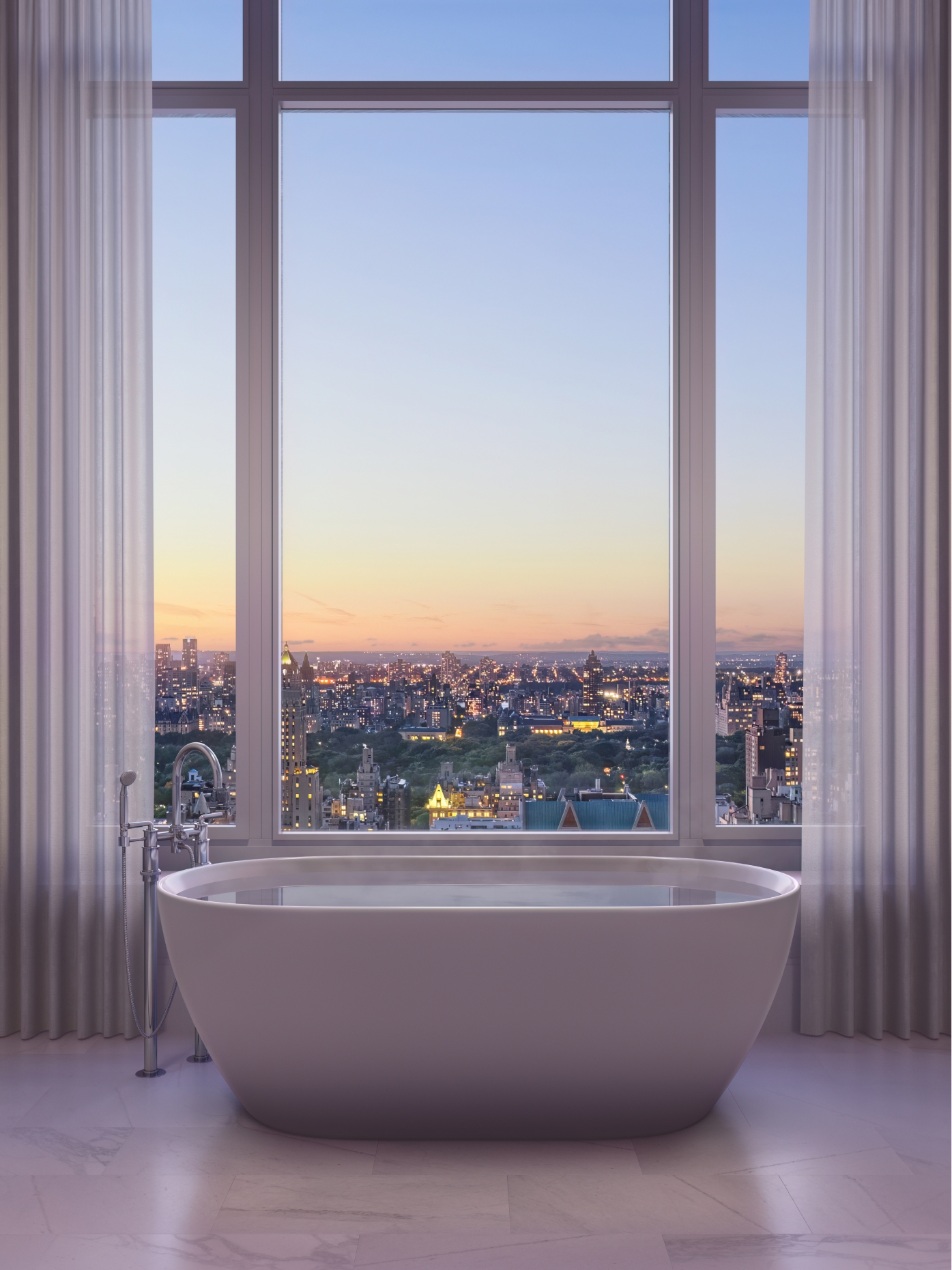 Luxurious penthouse bath with captivating sunset view over the city at the UES brand new condominiums at 255 E 77th street.