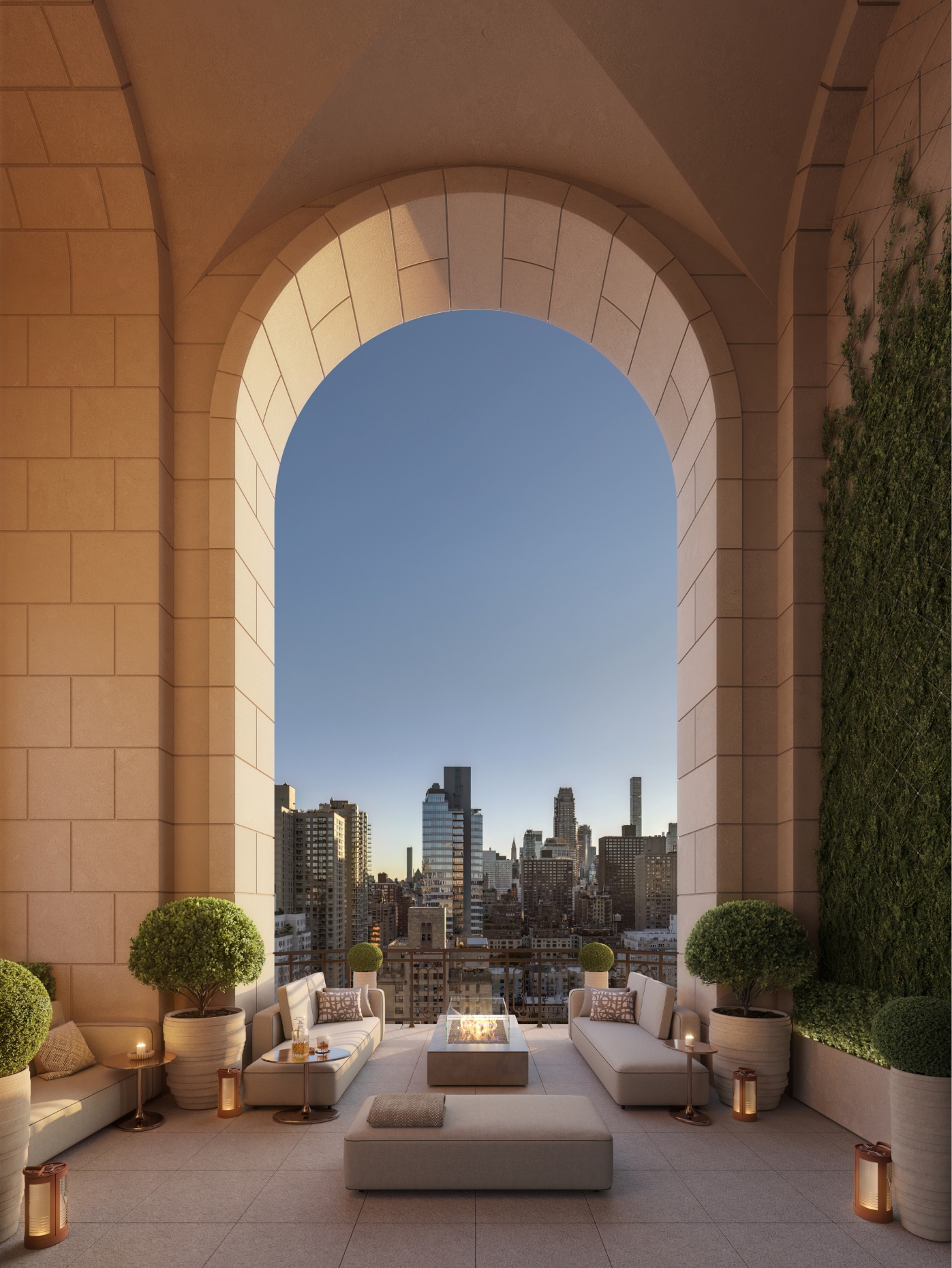 Bespoke stone mantel fireplace with a generous outdoor firepit in the Winter Garden terrace at 255 E 77 condominiums in UES.